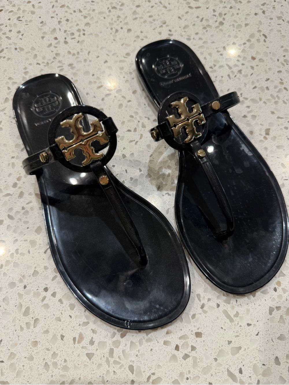 Tory Burch Black Jelly Thong Sandals with Gold Logo Accent